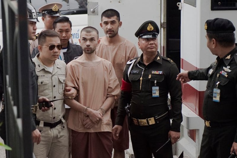 Bangkok court clears Thai woman of link to accused Uyghur bombers