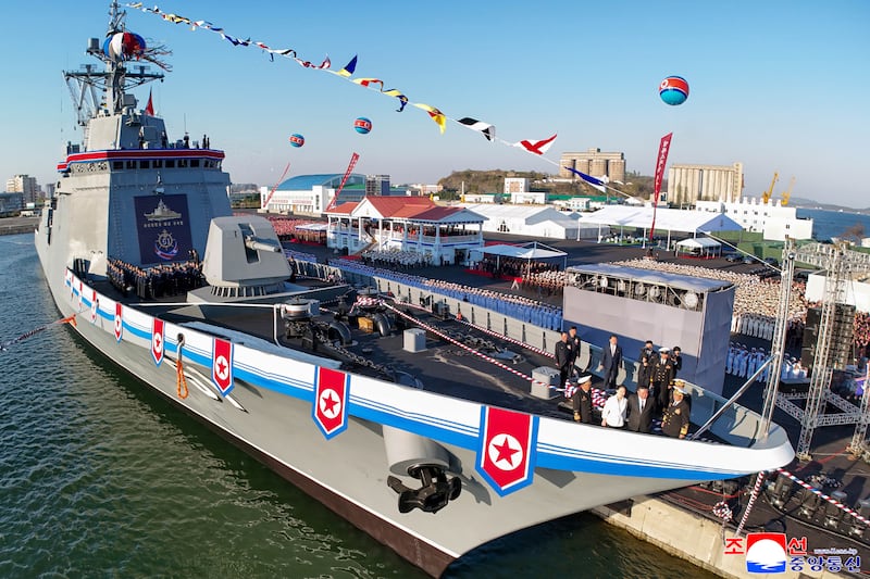 This picture taken on April 25, 2025, and released by the North Korean government shows leader Kim Jong Un and daughter Ju Ae attending the launch ceremony of a newly-built destroyer in Nampo, North Korea.