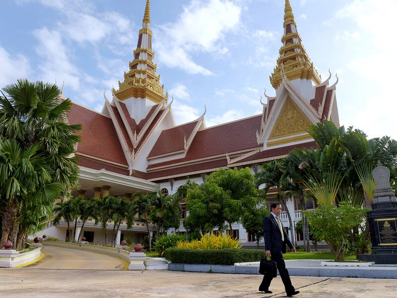 Lim Kimya, a member of the National Assembly from Cambodia National Rescue Party, walks out of the National Assembly Building in Phnom Penh, Cambodia, Nov. 8, 2017.